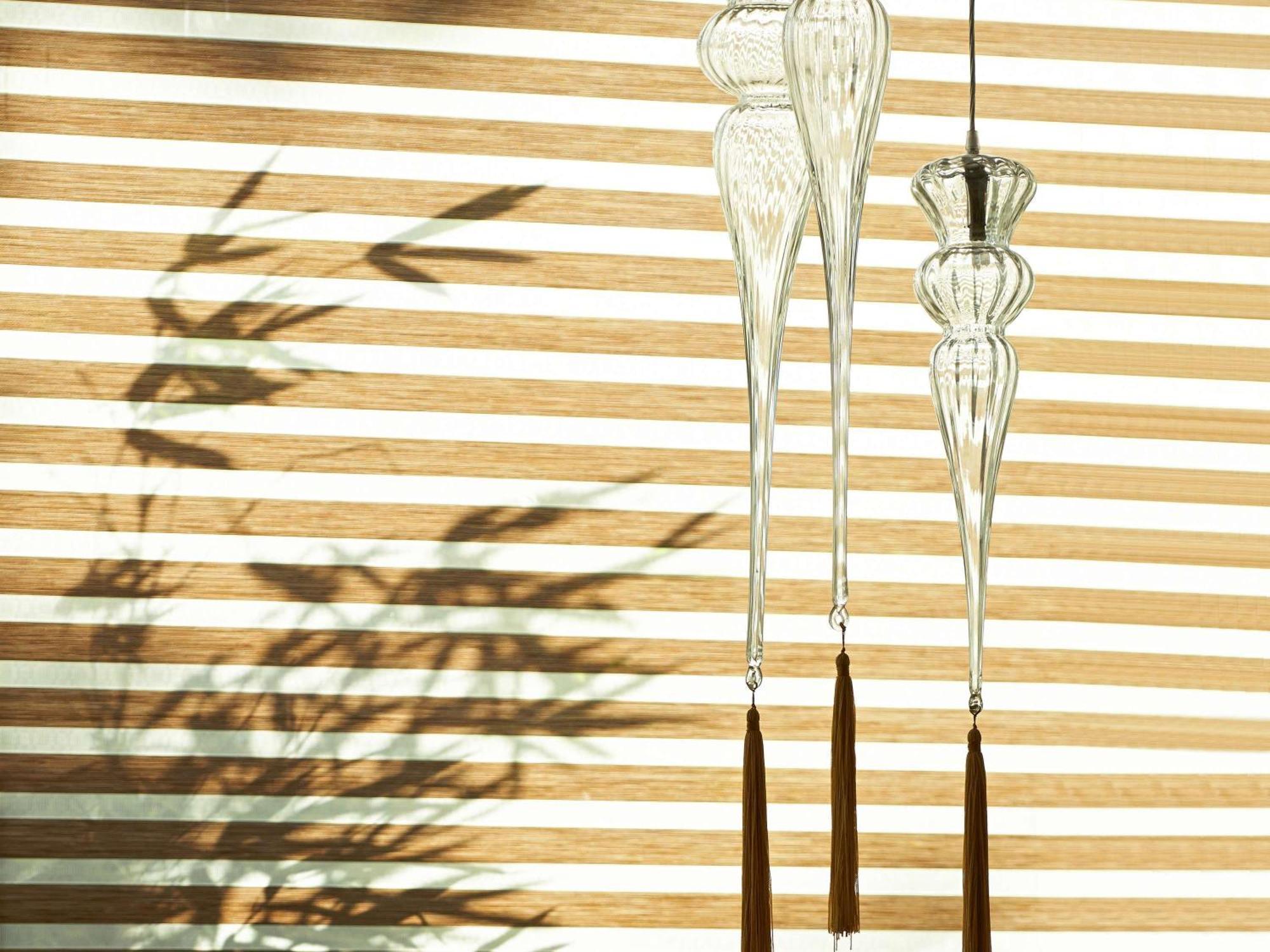 Fairmont Makati Hotel San Pedro Makati Eksteriør billede Hanging bamboo wind chime